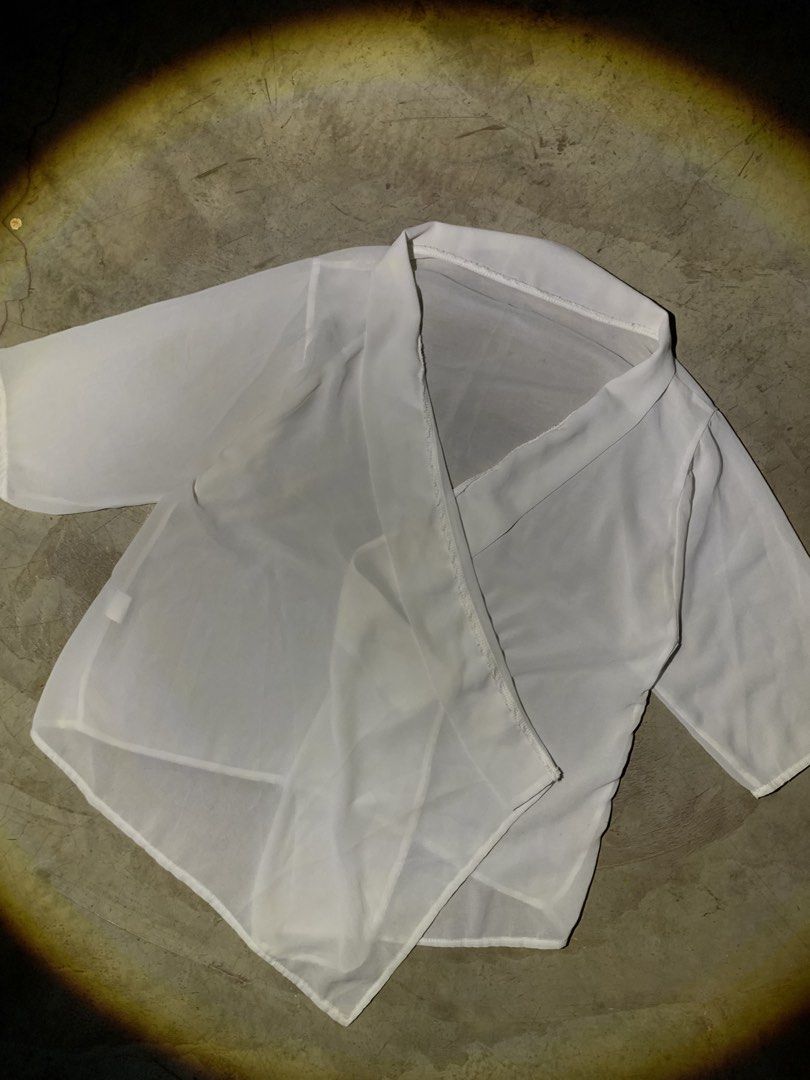 Sheer Kimono Style Wrap Top (Category: Blouses) located in Rizal. Submitted by pcesspscl145 (Listing ID 1463664652, Image 2). Description: - Lightweight sheer fabric - Kimono-style wrap design - Short sleeves - Flowy with a subtle sheen - Ideal for layering over camisoles or bralettes - Adds elegance to any outfit - Easy to wear and style.