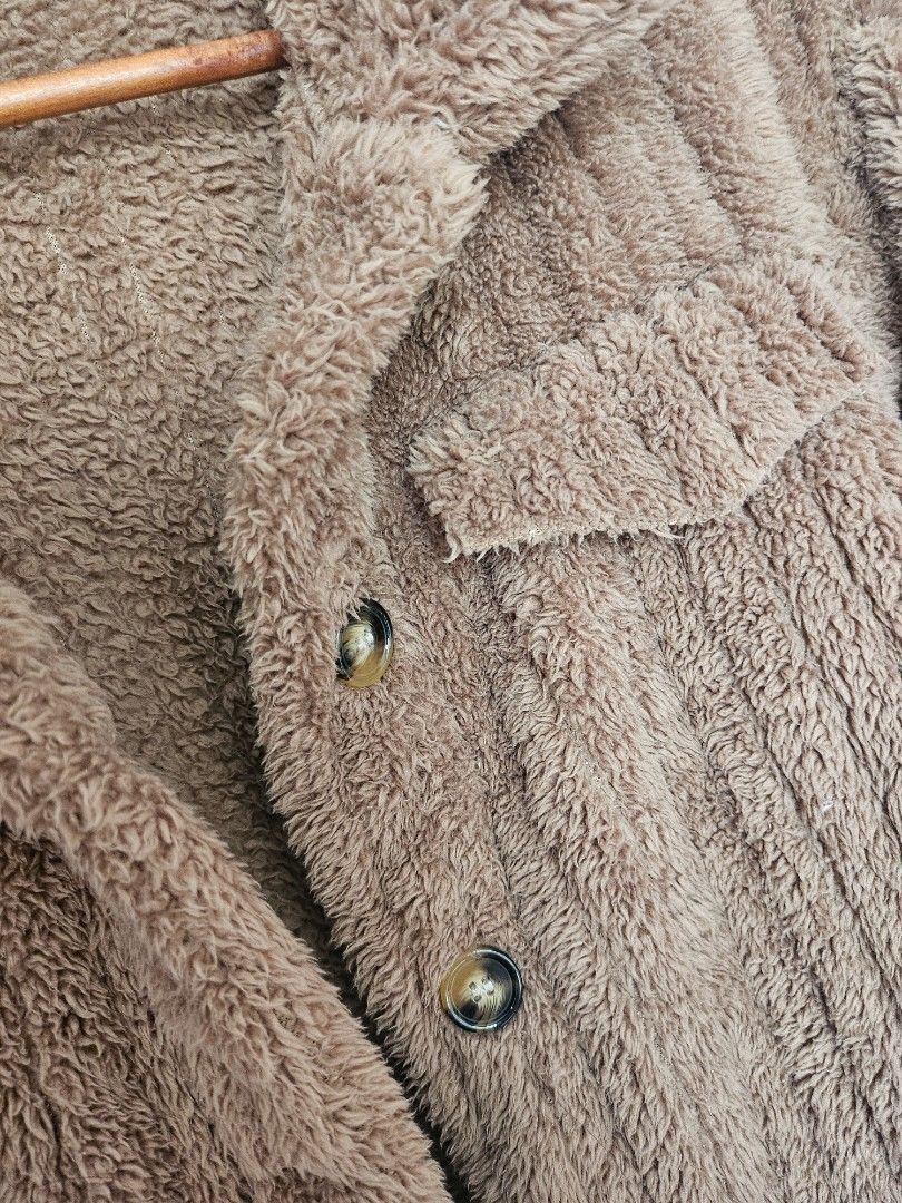 SHEIN Brown Fuzzy Autumn/Fall Jacket (Category: Coats, Jackets and Outerwear) located in Taguig. Submitted by ynalorenzo (Listing ID 1463620834, Image 2). Description: - Super soft and cozy brown fuzzy jacket - Brand: SHEIN - Features: Button-up front, two chest pockets - Ideal for layering in cold weather - Comfortable and stylish.
