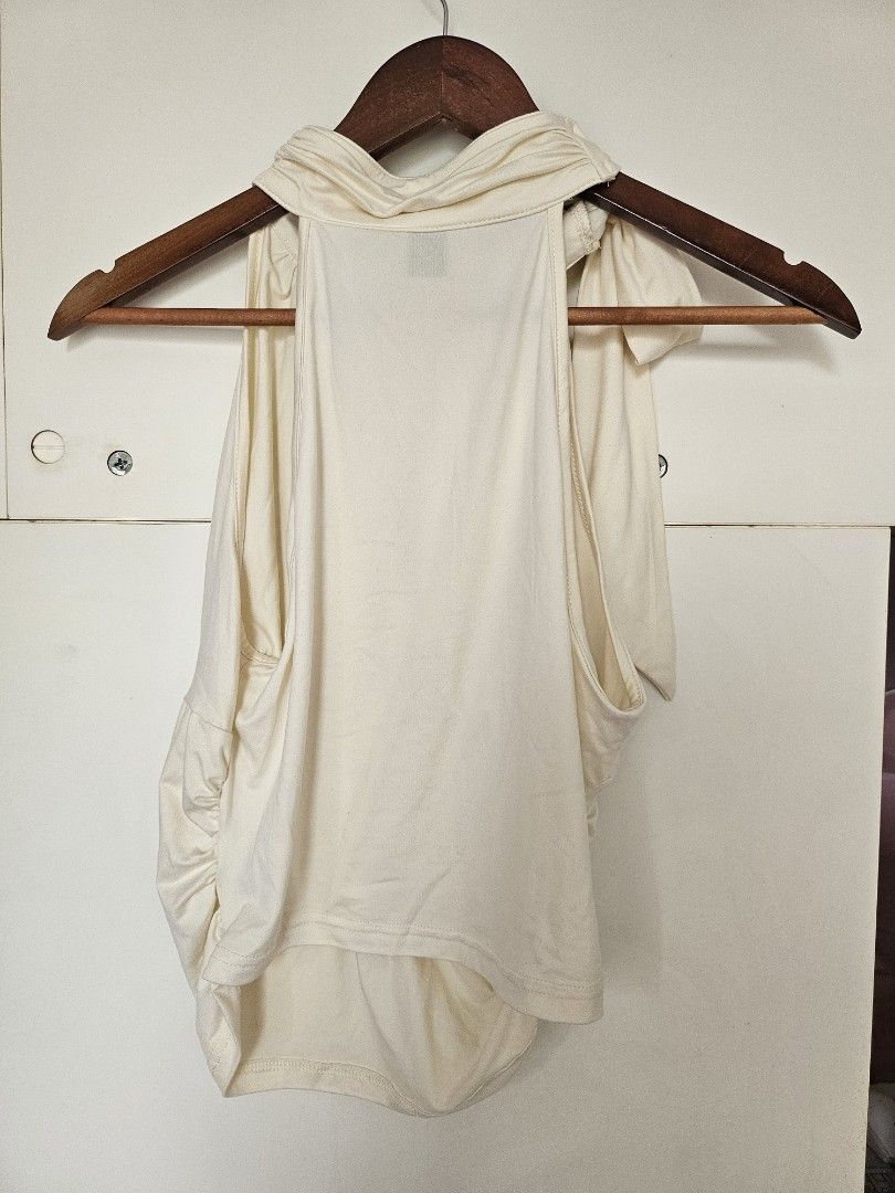 SHEIN Cream Ruched Neck Ribbon Top (Category: Blouses) located in Taguig. Submitted by ynalorenzo (Listing ID 1463620118, Image 3). Description: - SHEIN cream top - Features a ruched neckline with a tie detail - Made from a soft, comfortable fabric.