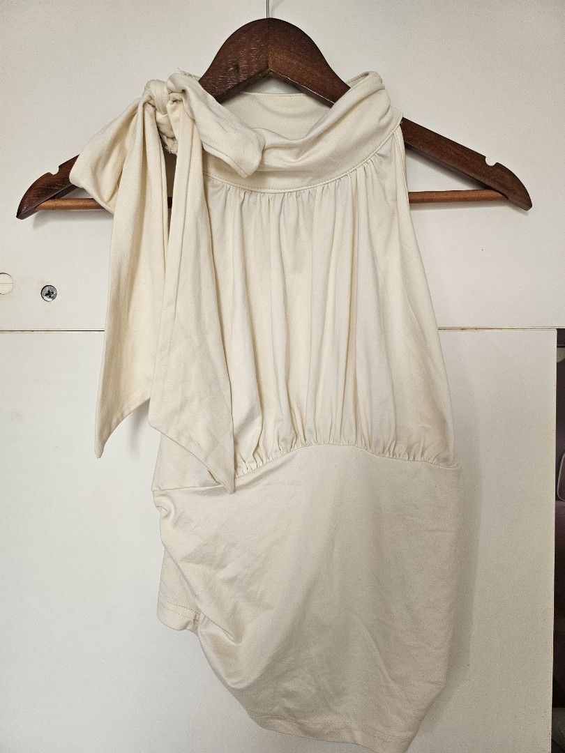 SHEIN Cream Ruched Neck Ribbon Top (Category: Blouses) located in Taguig. Submitted by ynalorenzo (Listing ID 1463620118, Image 1). Description: - SHEIN cream top - Features a ruched neckline with a tie detail - Made from a soft, comfortable fabric.