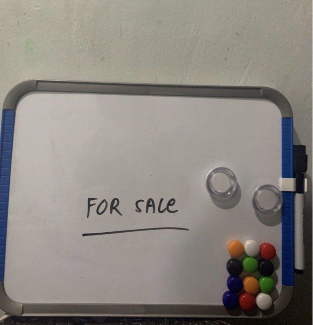 Small Whiteboard with Magnets and Marker (Category: Stationery & School Supplies) located in Manila. Submitted by decluterthings888 (Listing ID 1463569445, Image 1). Description: - Small whiteboard ideal for notes and reminders - Comes with magnetic clips - Includes a set of colorful magnetic push pins - Attached black dry-erase marker - Handy for fridge or office desk.