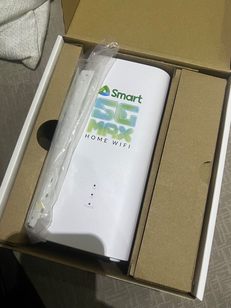 Smart 5G MAX Home WiFi Router with UNLI DATA (Category: Networking) located in Manila. Submitted by adie4103_3 (Listing ID 1463588365, Image 2). Description: - Experience up to 600 Mbps speeds with Smart 5G MAX Home WiFi. - Connect up to 40 devices simultaneously. - Comes with UNLI DATA, valid for 15 days. - Download the KiQ app for a personalized user experience. - Original Price: P4,990 - Sale Price: P3,740 - Selling Price: 3,000 -Only used for