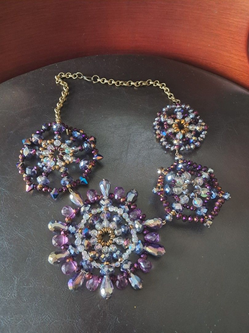 Snowflake or wheel-like statement necklace (Category: Necklaces) located in Quezon City. Submitted by kate_168 (Listing ID 1463625118, Image 1). Description: One-of-a-kind Handmade Made of Austrian and Imported Crystals MOP: Gcash Delivery: c/o buyer Location: Quezon City.