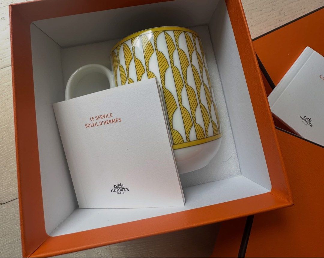 Soleil d'Hermes Mugs (Category: Coffee & Tea Tableware) located in Cainta. Submitted by kairus.luckyfind (Listing ID 1463668476, Image 3). Description: - Authentic Hermes mugs - From the 'Soleil d'Hermes' collection - Features a charming yellow and white pattern - Includes original orange Hermes boxes - Comes with accompanying paperwork - Proudly made in France - Ideal for gifting or personal collection - P10k each, nego for sure buyers only.