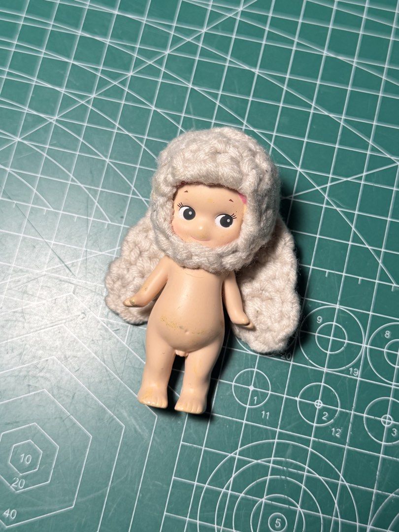 sonny angel sweet series (Category: Designer & Blind Box Toys) located in Baguio. Submitted by nothingphil (Listing ID 1463721636, Image 1). Description: - sonny angel sweet series (jelly bean) - heavily used (with stains) - with crochet bunny hat made by me - negotiobale rfs: decluttering.
