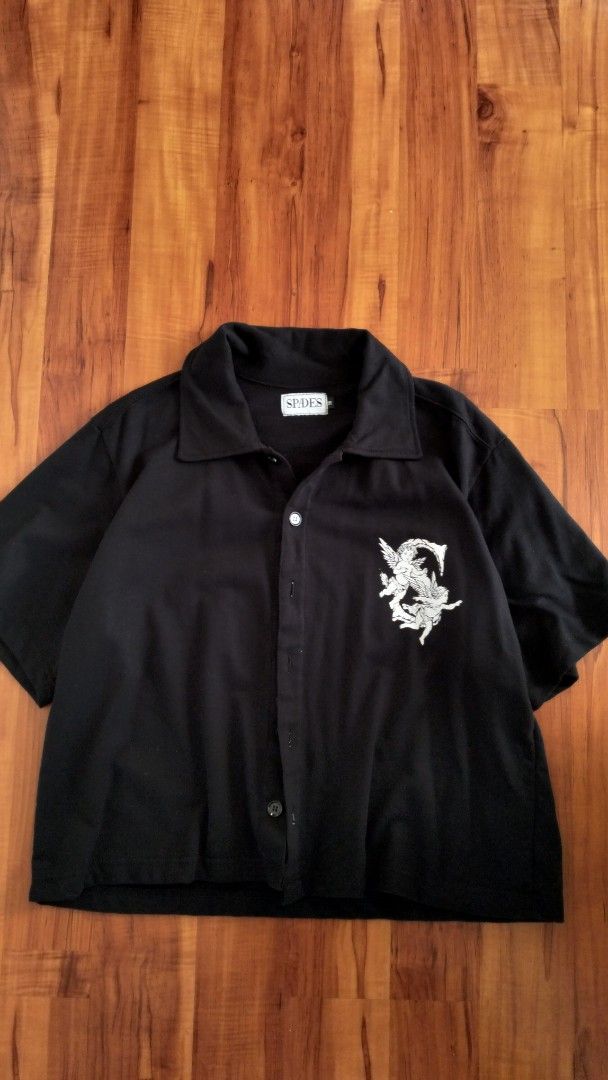 SPADES Black Cherub Graphic Button Up Shirt (Category: Tshirts & Polo Shirts ) located in Makati City. Submitted by gabsnxtdoor (Listing ID 1463740766, Image 1). Description: M on TAG Size Guide on site M - 5'2-5'4 Never been used.