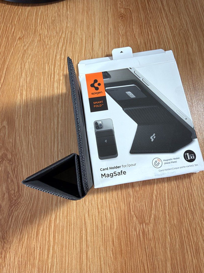 Spigen Magsafe Wallet and Stand (Category: Wallets & Card Holders) located in Pasig City. Submitted by snoca (Listing ID 1463696173, Image 3). Description: Dont use it that much since i have a wallet already.