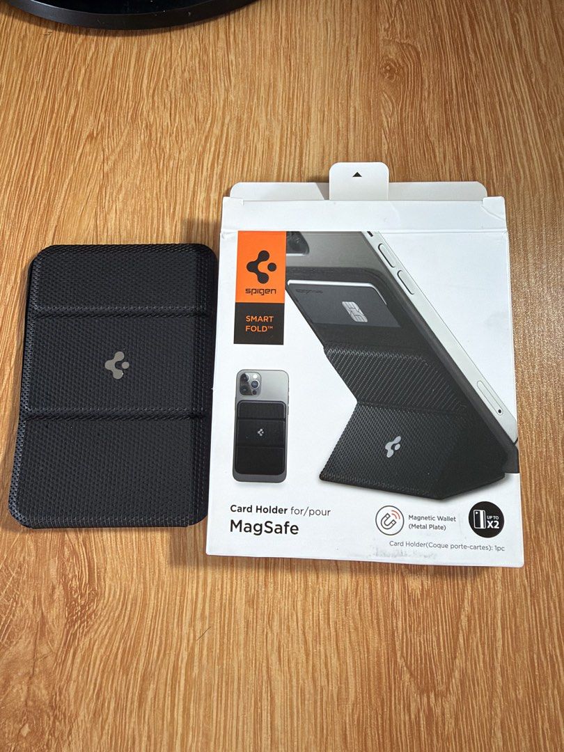 Spigen Magsafe Wallet and Stand (Category: Wallets & Card Holders) located in Pasig City. Submitted by snoca (Listing ID 1463696173, Image 1). Description: Dont use it that much since i have a wallet already.