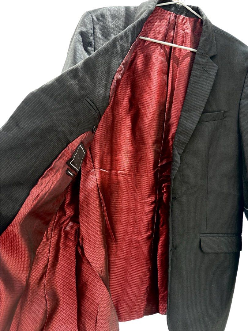 Splash Men's Blazer Size 38 Contemporary Fit (Category: Coats, Jackets and Outerwear) located in Cagayan de Oro. Submitted by divinephoenix (Listing ID 1463615949, Image 2). Description: - Brand: Splash - Color: Black with pinstripes - Lining: Bold red pattern - Fit: Contemporary - Size: 38 - Closure: Two-button - Pockets: Flap pockets - Cuffs: Button details - Occasion: Smart casual to formal.