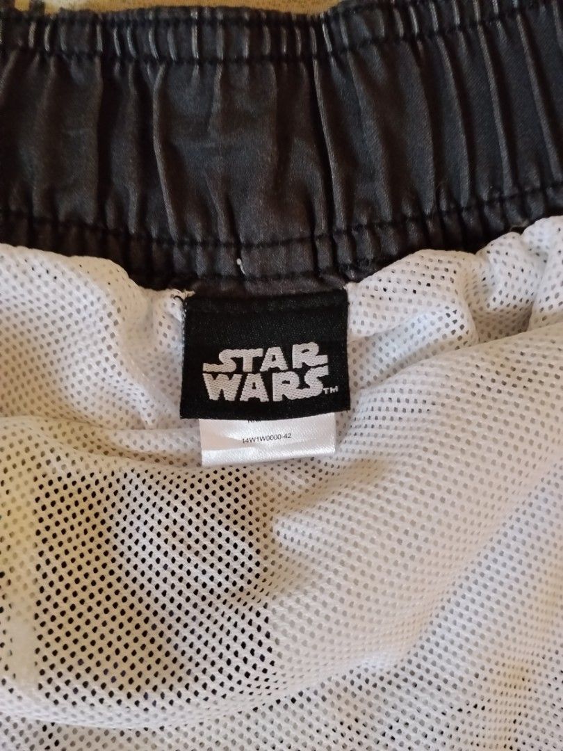 Star Wars Comic Print Swim Shorts (Category: Swim Trunks & Board Shorts) located in Manila. Submitted by titokingcuratedarchive (Listing ID 1463737124, Image 3). Description: - Awesome Star Wars themed swim shorts - Features a fun comic book style print with Chewbacca and R2-D2 - Comfortable elastic waistband with adjustable drawstring - Built-in mesh lining for support - Ideal for swimming, beach days, or pool parties Size : L ( 36W).
