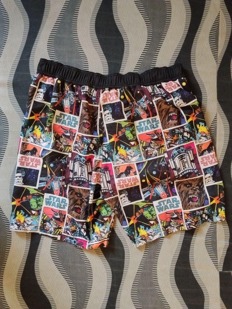 Star Wars Comic Print Swim Shorts (Category: Swim Trunks & Board Shorts) located in Manila. Submitted by titokingcuratedarchive (Listing ID 1463737124, Image 2). Description: - Awesome Star Wars themed swim shorts - Features a fun comic book style print with Chewbacca and R2-D2 - Comfortable elastic waistband with adjustable drawstring - Built-in mesh lining for support - Ideal for swimming, beach days, or pool parties Size : L ( 36W).