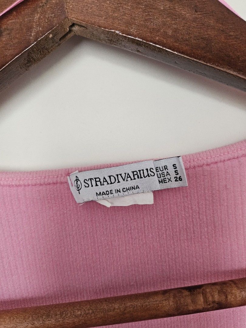 Stradivarius Ribbed Cropped Top Pink (Category: Shirts) located in Taguig. Submitted by ynalorenzo (Listing ID 1463621924, Image 2). Description: - Pink ribbed cropped top from Stradivarius - Short sleeves - Scoop neckline - Comfortable and stretchy material - Fits size S.