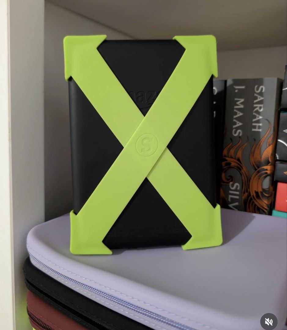 Strapsicle in Medium (Category: Cases & Sleeves) located in Manila. Submitted by prelovedbyaaaaaaa (Listing ID 1463741997, Image 1). Description: Used only for fitting. It didn’t fit my Kindle. Color: Neon Zest. Other colors are already sold..