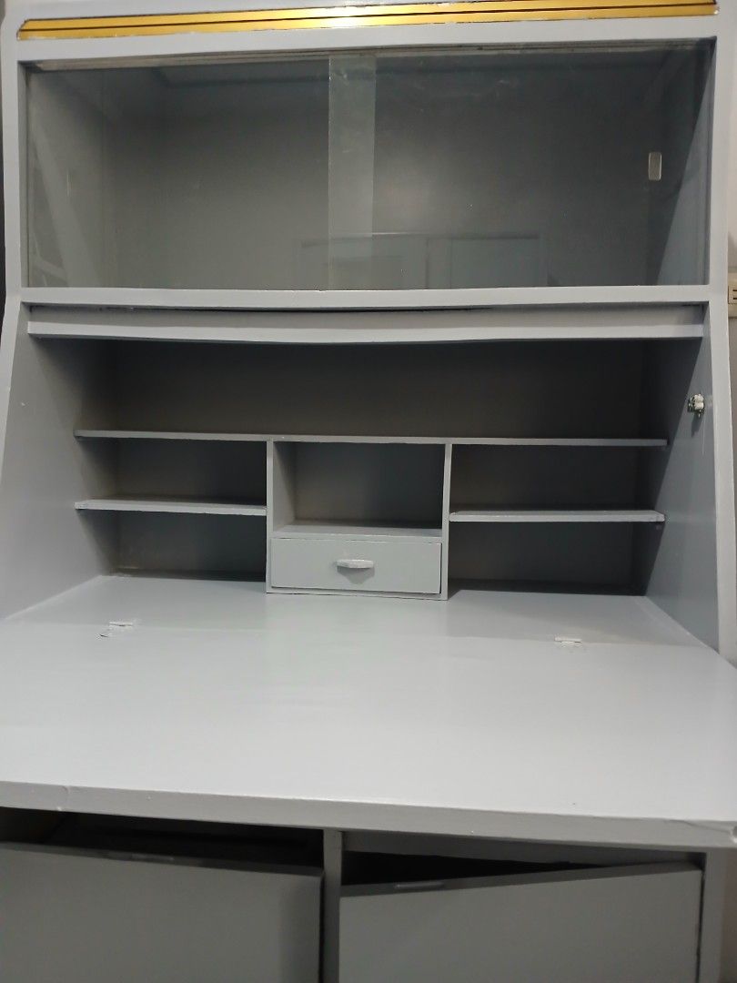 Study table with Drawers and Shelves (Category: Shelves, Cabinets & Racks) located in Manila. Submitted by apoloniaa.apolinar (Listing ID 1463573082, Image 3). Description: light Grey wood cabinet,3 drawers Good for organizing files ,with chair ..