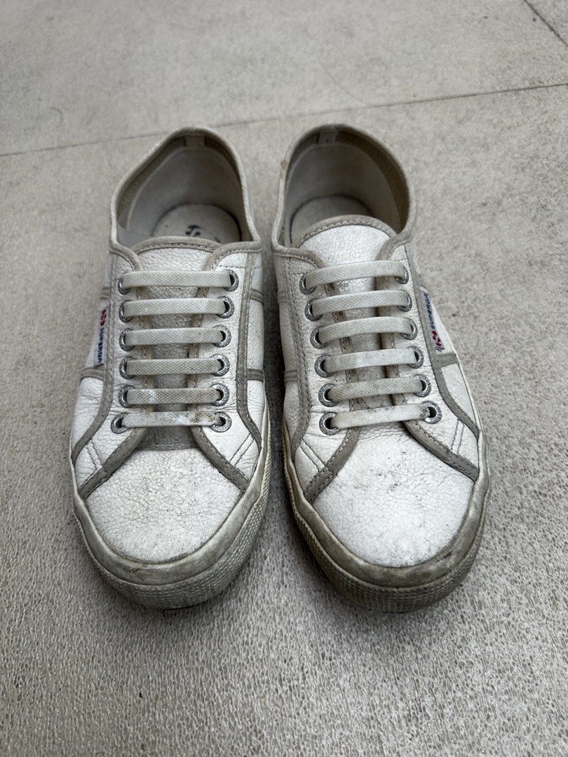 Superga White Leather Sneakers (Category: Sneakers) located in Quezon City. Submitted by jareddeuna (Listing ID 1463562570, Image 1). Description: - Classic white Superga sneakers - Genuine leather material - Size: 40 EU - Ideal for everyday wear - Sold as is.