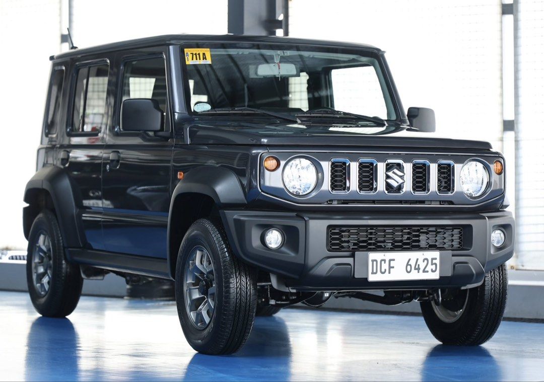 Suzuki Jimny Manual (Category: Used Cars) located in Quezon City. Submitted by marcars_trading (Listing ID 1463572165, Image 2). Description: 2025’s Suzuki JIMNY GL M/T 5-Door 1.230M (neg) trade in ok! 1,300kms ONLY! SUPER LOW MILEAGE! GOOD as BRANDNEW! IMMACULATE, VERY FRESH & PRESERVED Condition Must see to believe - 1st owner - Complete owner's manual, booklets & spare key - 1.5L 16valve 4CYL GAS Engine - 100HP (0 to 100kph in 12 seconds) - 5s
