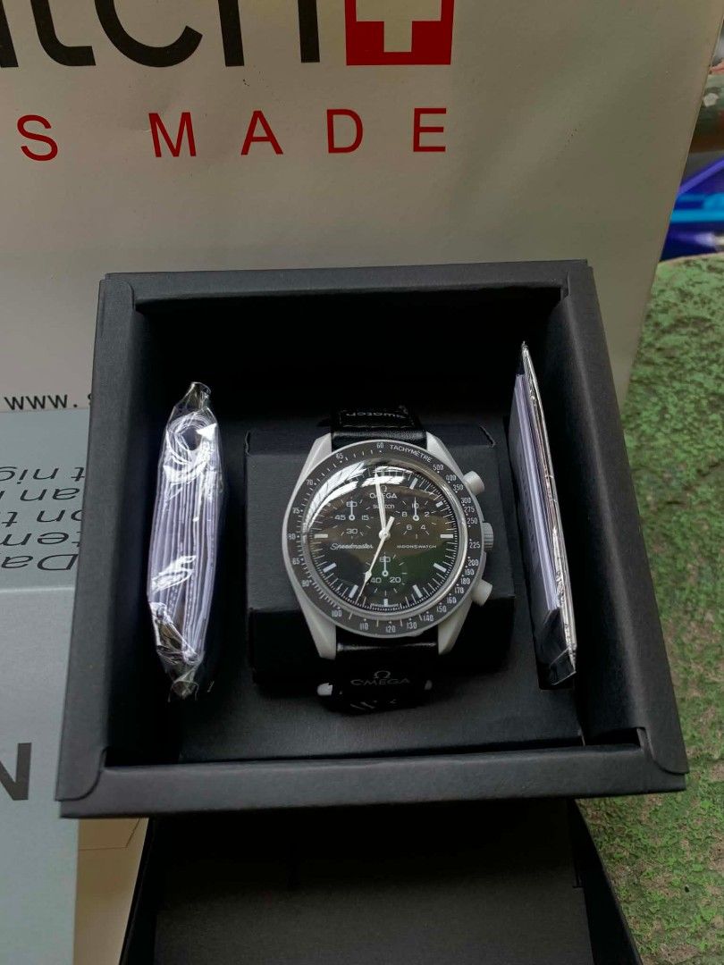 swatch x omega collaboration watch (Category: Men's Watches) located in Manila. Submitted by trustthrift2002 (Listing ID 1463644938, Image 2). Description: swatch x omega collaboration watch mission to the moon like new with box and paper bag inclusion.