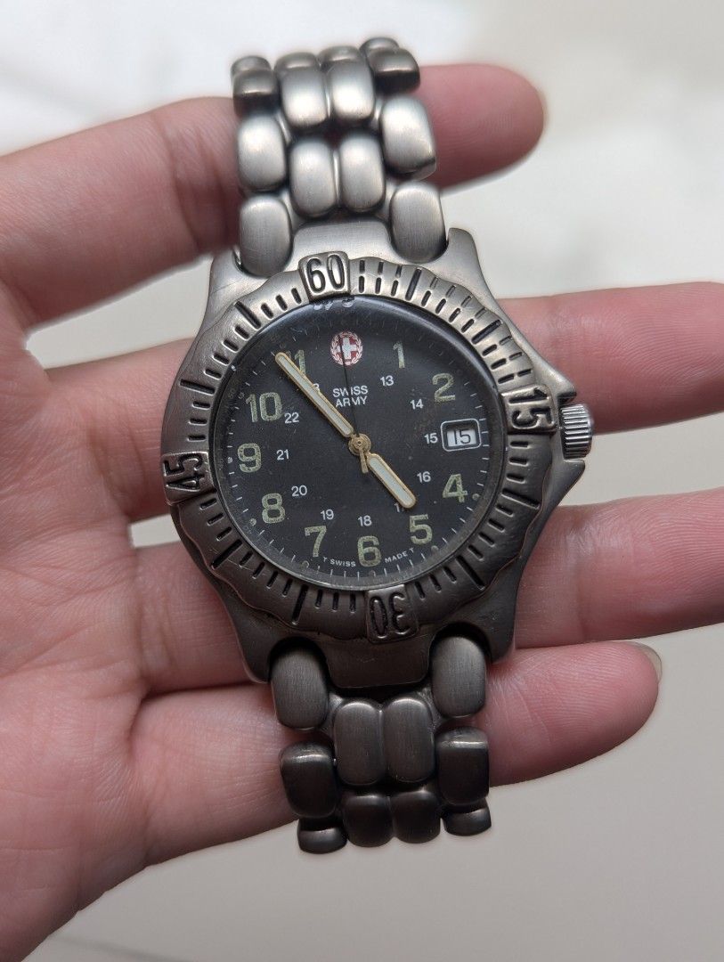 Swiss Army Automatic Full Titanium Watch (Category: Luxury Watches) located in Quezon City. Submitted by dustydialsph (Listing ID 1463661032, Image 1). Description: - Swiss Army Automatic Watch - Dark Dial with Luminous Hands & Markers - Date Window at 3 o'clock - Stainless Steel Bracelet with Fold-over Clasp - See-Through Caseback to View Movement - Classic Design for Everyday Wear.