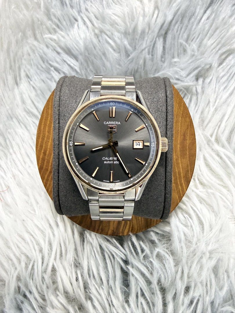 TagHeuer Carrera Caliber 5 (Category: Luxury Watches) located in Angeles City. Submitted by nhickbasada029 (Listing ID 1463627577, Image 1). Description: For Sale‼️‼️‼️ Pre Owned TagHeuer Carrera Calibre 5 WAR215E with an 18k rose gold bezel and two tone steel/18k gold bracelet. *Ref#WAR215E *Case size:39mm *Movement: Caliber 5 Automatic *Power Reserve:38hrs *Dial Color: Anthracite/Grey with luminous rose gold two hands and index markers. *Bezel: