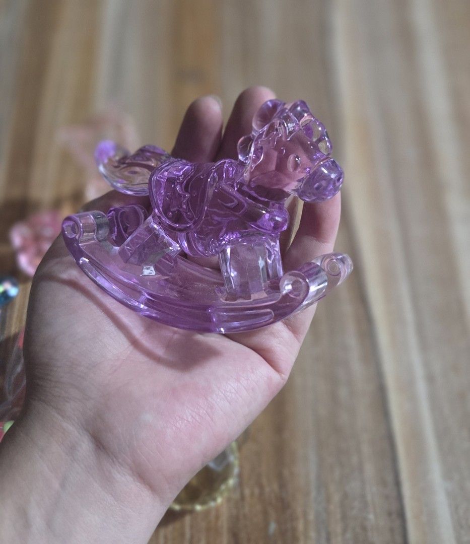 TAKE ALL Cute Crystal Animal Figurines - Assorted Colors (Category: Designer & Blind Box Toys) located in Buguias. Submitted by pufflydeclutter_ph (Listing ID 1463627074, Image 3). Description: - Adorable crystal figurines perfect for display or gifting. - Collection includes: Pink Cat, Pink Bear, Blue Turtle, Yellow Crystal, Orange Crystal, Purple Rocking Horse, Pink Sheep. - Beautifully catch the light and add a touch of sparkle. - Great as sma