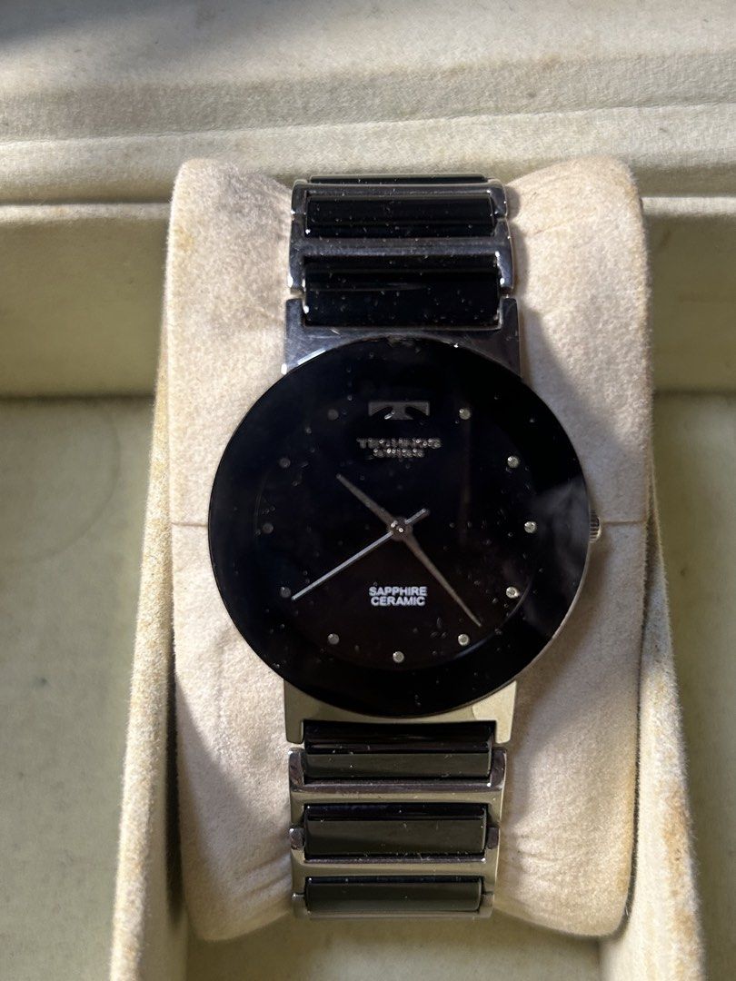 Technos Swiss Sapphire Ceramic Watches (3 pcs) (Category: Men's Watches) located in Cavite. Submitted by mamamia73 (Listing ID 1463718901, Image 3). Description: - Set of 3 Technos Swiss watches - Includes 2 rectangular face and 1 round face watch - All watches have black ceramic bands and faces - Features durable sapphire crystal - Versatile for everyday wear or special occasions 2500 each all in working condition .