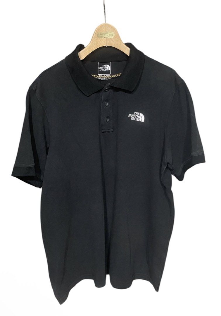 The North Face Black Polo Shirt (Category: Tshirts & Polo Shirts ) located in San Pedro. Submitted by lifebeginsaftercoff33 (Listing ID 1463695220, Image 3). Description: - Brand: The North Face - Color: Black - Dimes: 22.5-23 x 27 in - Features: Embroidered logo on chest and back, button-up collar - Condition: Good for casual wear - In very good condition - very soft comfy thick stretchy fabric Color rate is very good - some pictures due of ligh
