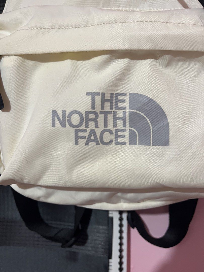The North Face Cream Drawstring Backpack (Category: Backpacks) located in Carmen, Agusan del Norte. Submitted by all.en.thrifts (Listing ID 1463666753, Image 2). Description: - Brand: The North Face - Color: Cream - Type: Drawstring backpack - Features: Front zip pocket, adjustable straps, main drawstring closure, inner zip pocket - Ideal for: Everyday use, travel.
