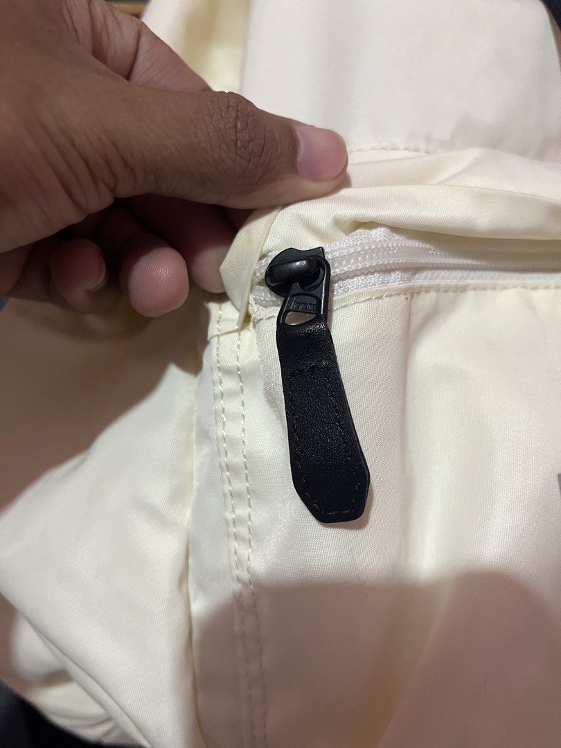 The North Face Cream Drawstring Backpack (Category: Backpacks) located in Carmen, Agusan del Norte. Submitted by all.en.thrifts (Listing ID 1463666753, Image 3). Description: - Brand: The North Face - Color: Cream - Type: Drawstring backpack - Features: Front zip pocket, adjustable straps, main drawstring closure, inner zip pocket - Ideal for: Everyday use, travel.