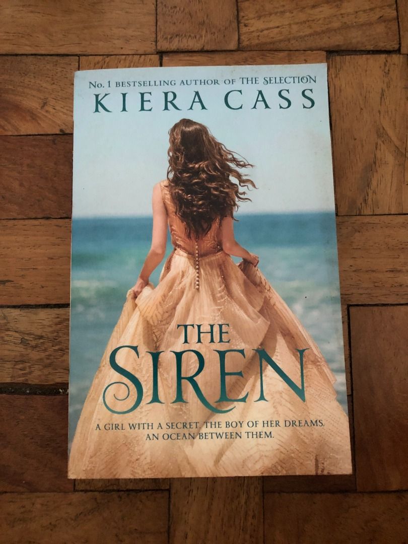 THE SIREN BY KIERA CASS (Category: Storybooks) located in Caloocan City. Submitted by clearup_closet (Listing ID 1463738224, Image 1). Description: softbound authentic mop: gcash, mari, gotyme, and maya.