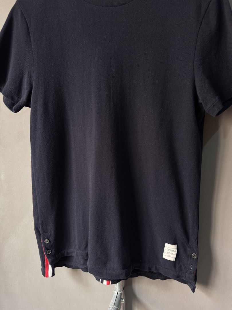 Thom Browne - Grosgrain Back Stripe Navy Tshirt (Category: Activewear) located in Cabuyao City. Submitted by _streetflavor (Listing ID 1463678575, Image 3). Description: Thom Browne - Grosgrain Back Stripe Navy Tshirt Excellent Size: 2 on tag fits medium Length: 25.5/27 Width: 19 -1880 pesos Dm.