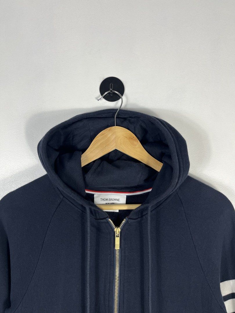 thom browne zip up hoodie (Category: Coats, Jackets and Outerwear) located in Bacolod City. Submitted by piquedup.ph_v2 (Listing ID 1463696925, Image 2). Description: Size: | 20x24 Condition: Excellent Color rate: 9.5/10 (Color may vary to lighting) Flaws: None.