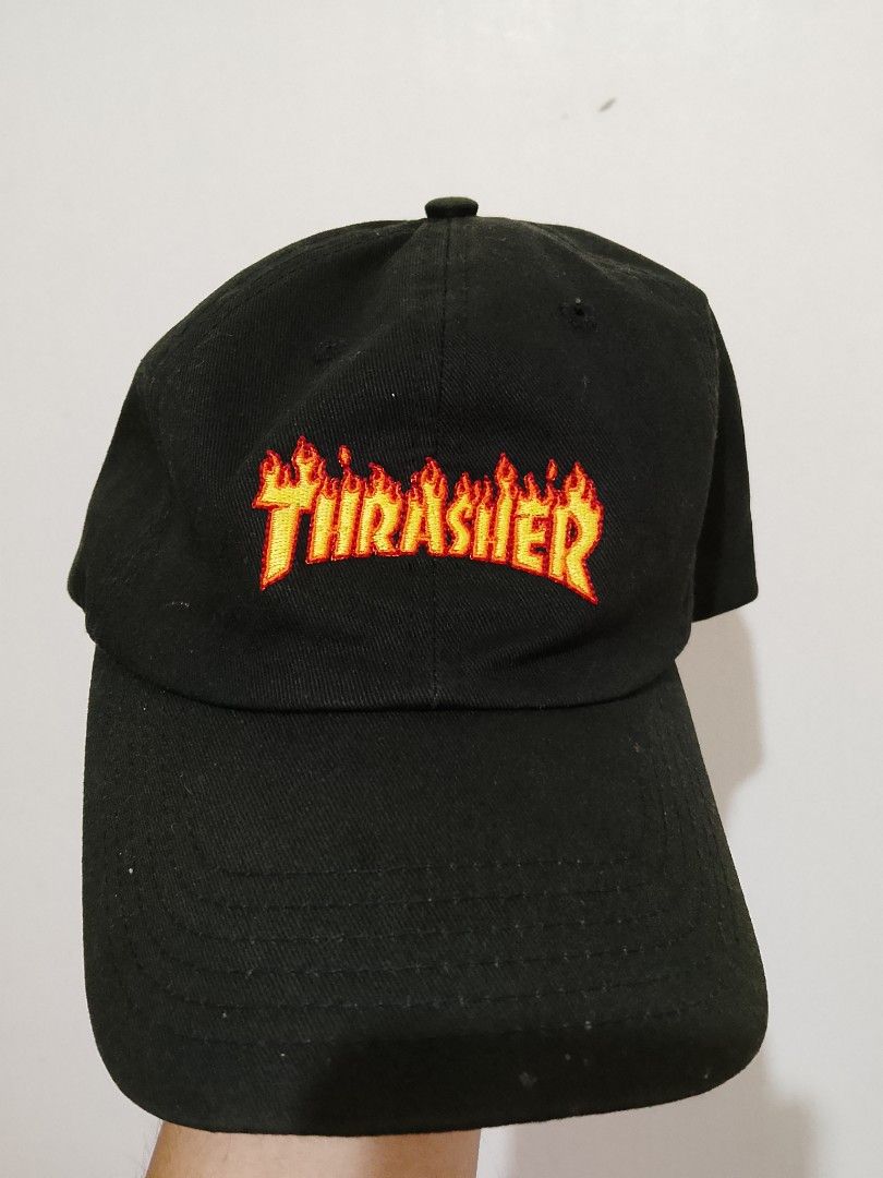 Thrasher Magazine Flame Logo Black Baseball Cap (Category: Caps & Hats) located in Manila. Submitted by juan.hundred04 (Listing ID 1463647868, Image 1). Description: - Classic black cap - Iconic Thrasher flame logo embroidery - Adjustable strap for a comfortable fit - Great for everyday or skate-inspired style - Some signs of wear on the inside.
