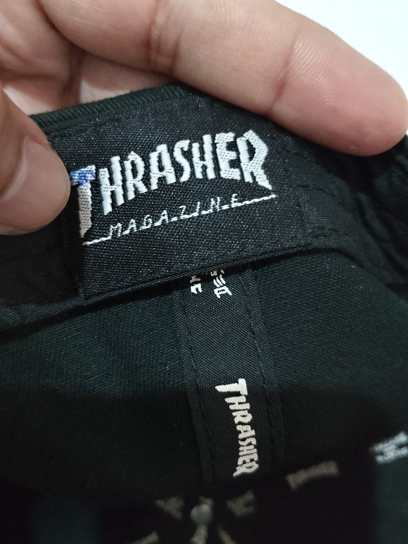 Thrasher Magazine Flame Logo Black Baseball Cap (Category: Caps & Hats) located in Manila. Submitted by juan.hundred04 (Listing ID 1463647868, Image 2). Description: - Classic black cap - Iconic Thrasher flame logo embroidery - Adjustable strap for a comfortable fit - Great for everyday or skate-inspired style - Some signs of wear on the inside.