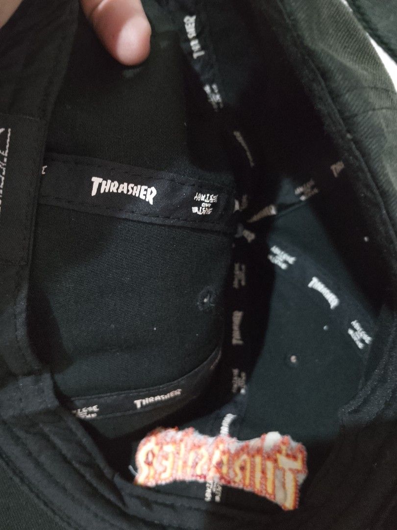 Thrasher Magazine Flame Logo Black Baseball Cap (Category: Caps & Hats) located in Manila. Submitted by juan.hundred04 (Listing ID 1463647868, Image 3). Description: - Classic black cap - Iconic Thrasher flame logo embroidery - Adjustable strap for a comfortable fit - Great for everyday or skate-inspired style - Some signs of wear on the inside.