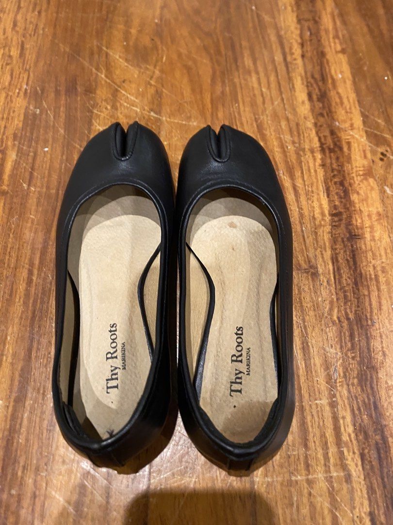 Thy Roots Black Tabi Ballerina Shoes (Category: Flats & Sandals) located in Makati City. Submitted by vanillasugar_ (Listing ID 1463663067, Image 3). Description: - Brand: Thy Roots Marikina - Style: Tabi Ballerina Flats - Color: Black - Material: Leather - Size: 7 - Features: Unique split-toe design RFS: Wrong size. Used only once. Soles showed discoloration when I attempted to clean them. Bought them for 6.5k..