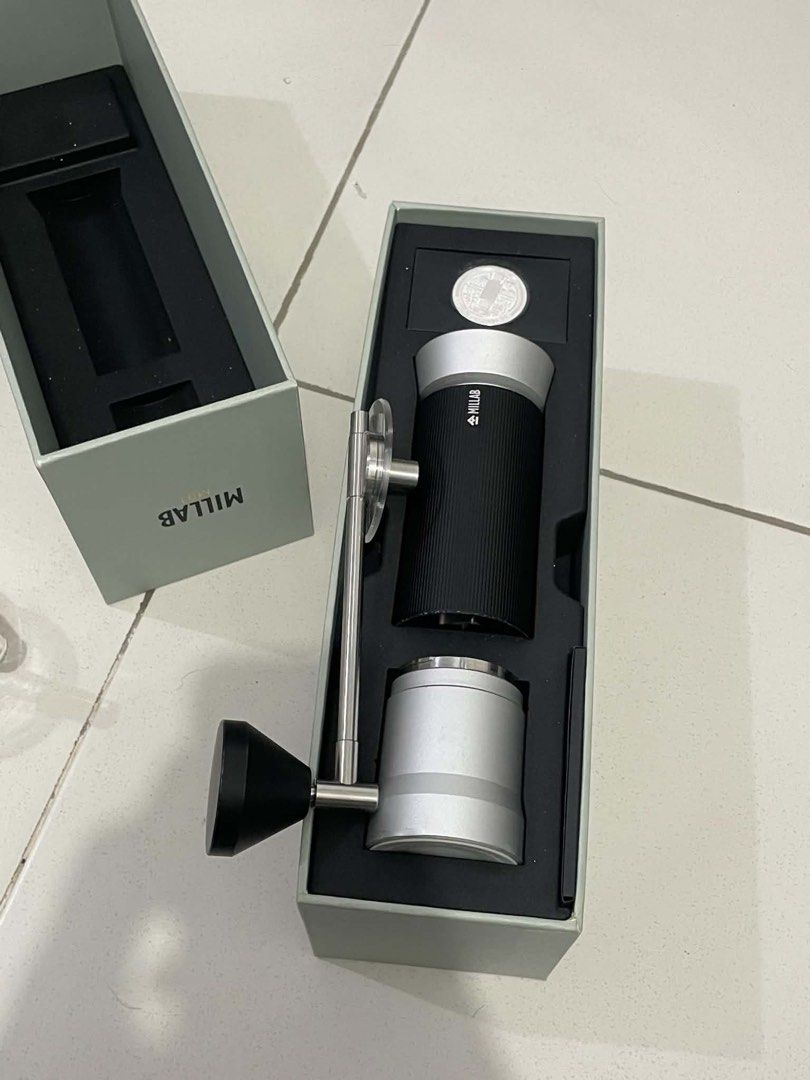 Timemore x MILLAB M01 Coffee Grinder (Category: Coffee & Tea Tableware) located in Pasig City. Submitted by andrrealee.1 (Listing ID 1463674494, Image 2). Description: TIMEMORE x Millab M01 Coffee Grinder * Type: Manual hand grinder * Burr: 44mm Pineapple Burrs * Burr Material: SUS420 hardened stainless steel * Grind Settings: 90 steps * Adjustment: 0.0125mm per step * Capacity: 35g * Catch Cup: Threadless snap-lock design * Dimensions: 66 × 197m