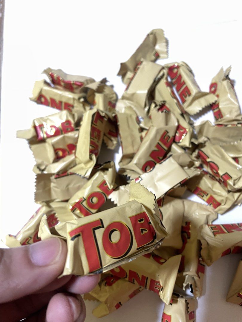 Toblerone Chocolate Bars - Individually Wrapped (Category: Packaged & Instant Food) located in Infanta. Submitted by frandez (Listing ID 1463583919, Image 2). Description: - Mini Toblerone bars - Individually wrapped in gold foil - Ideal for snacks or party favors - Plenty to share - Grab them while stocks last! 38 pieces (200g).