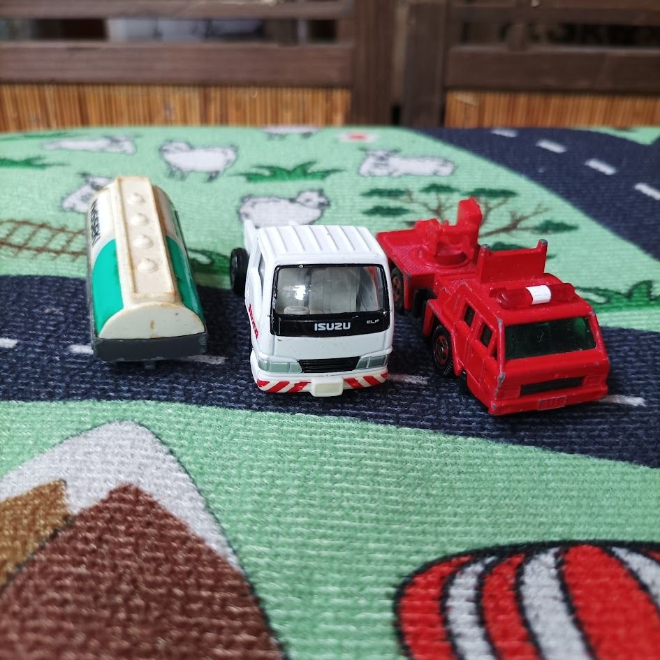 TOMICA DIE-CAST TOY TRUCKS SET (Category: Kids Toys) located in Dasmarinas. Submitted by k3japanstoreph (Listing ID 1463698482, Image 2). Description: TOMICA DIE-CAST TOY TRUCKS SET Set includes: TOMICA NISSEKI TANKER TRUCK Tomica die-cast tanker truck labeled “NISSEKI” from Nippon Oil. TOMICA ISUZU ELF Tomica die-cast model of the Isuzu Elf. TOMICA FIRE DEPARTMENT LIGHTING POWER VEHICLE Tomica die-cast model of a Fire Department Lighting Power V