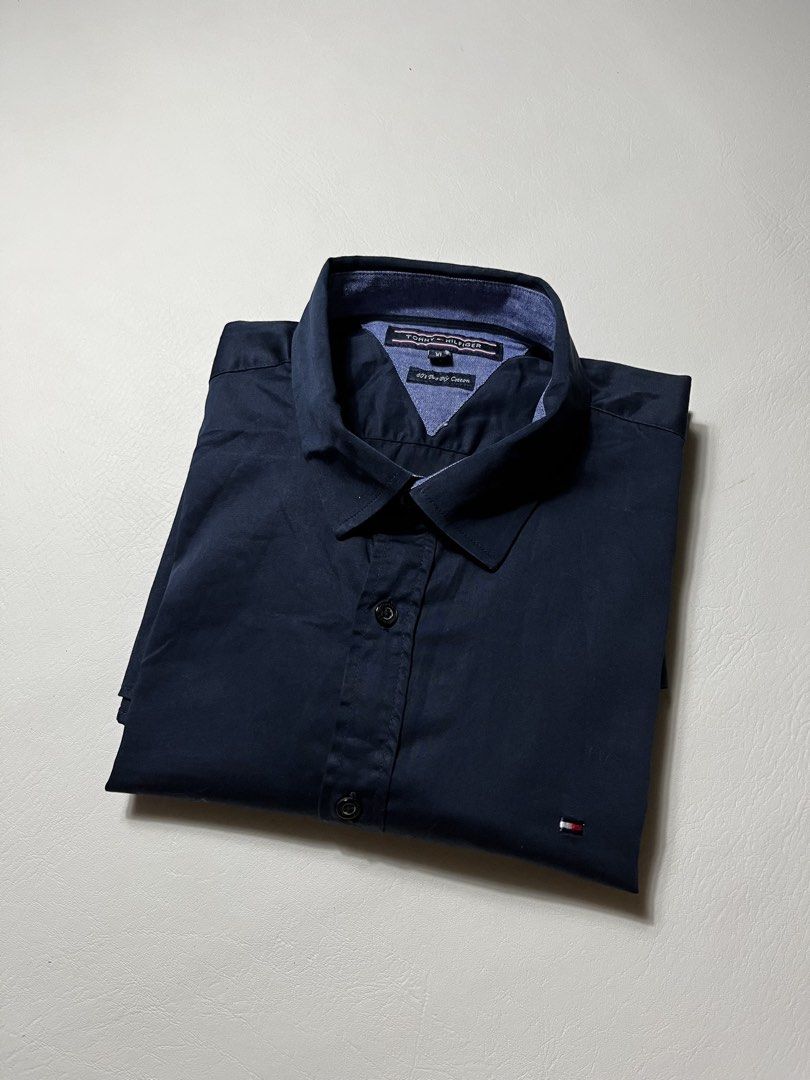 Tommy Hilfiger Long Sleeve (Category: Formal Shirts) located in Tacloban City. Submitted by calix.on (Listing ID 1463687140, Image 1). Description: Tommy Hilfiger Long Sleeve (dark blue) size xl width 23 length 29 like new condition no flaws.