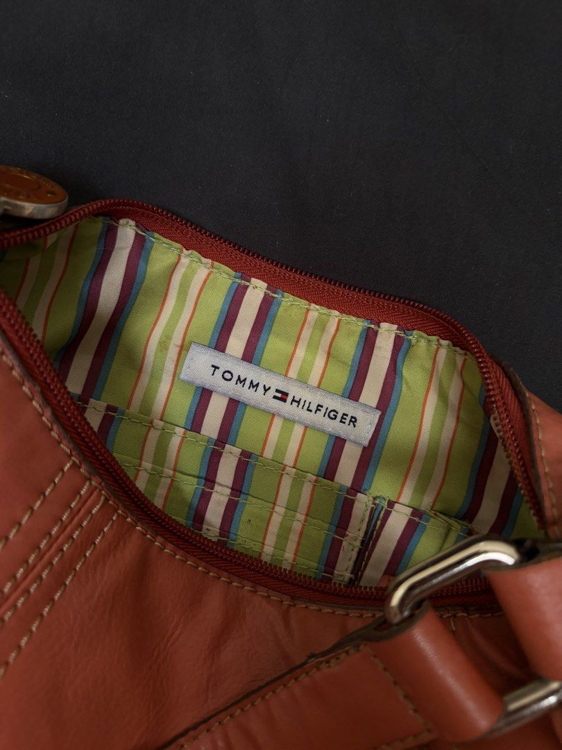 Tommy Hilfiger Orange Leather Shoulder Bag (Category: Shoulder Bags) located in Baliuag. Submitted by asdfraks (Listing ID 1463614859, Image 2). Description: - Authentic Tommy Hilfiger orange leather shoulder bag - ₱450 pesos - rfs: needs funds - jnt/flash shipping.