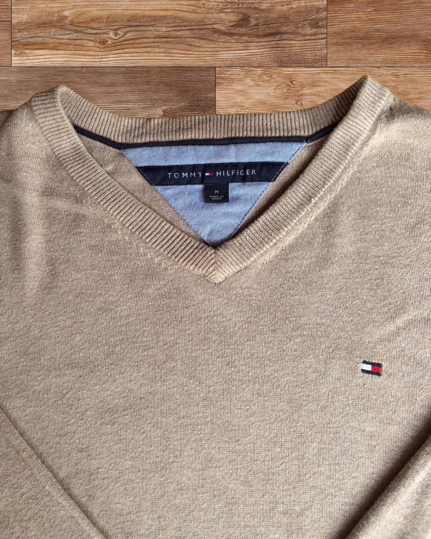 Tommy Hilfiger Solid Beige Fine Knit Pullover (Category: Coats, Jackets and Outerwear) located in Palayan City. Submitted by ms.el.apparel (Listing ID 1463669355, Image 2). Description: W 21 in L 26 in Lightweight, breathable cotton knit, perfect for local weather and layering.
