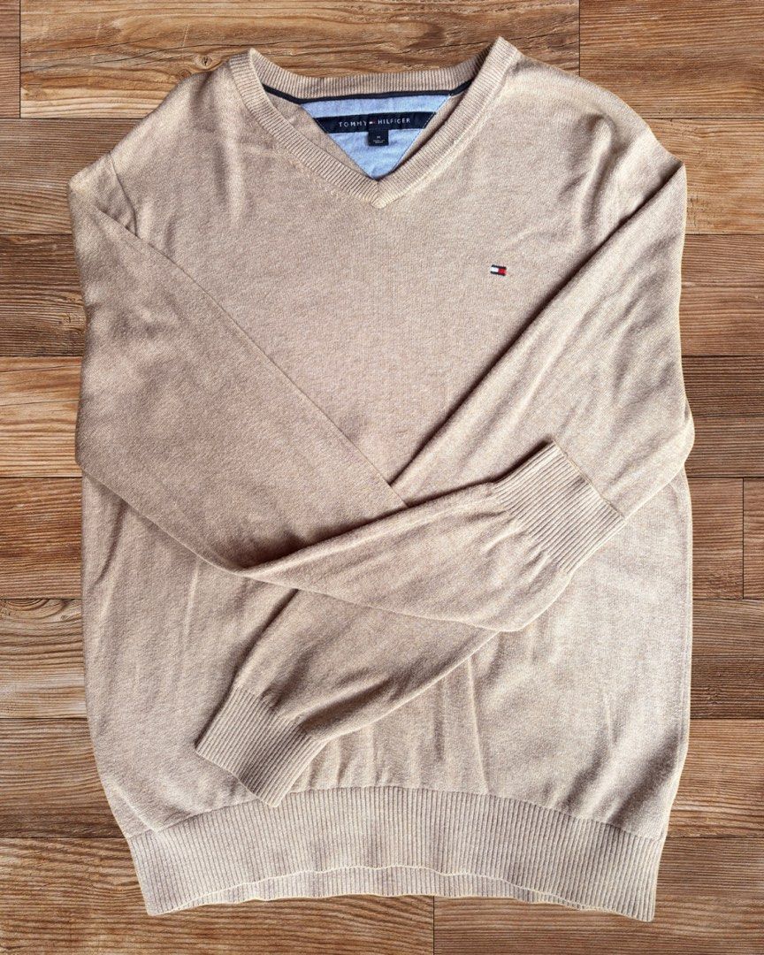 Tommy Hilfiger Solid Beige Fine Knit Pullover (Category: Coats, Jackets and Outerwear) located in Palayan City. Submitted by ms.el.apparel (Listing ID 1463669355, Image 1). Description: W 21 in L 26 in Lightweight, breathable cotton knit, perfect for local weather and layering.