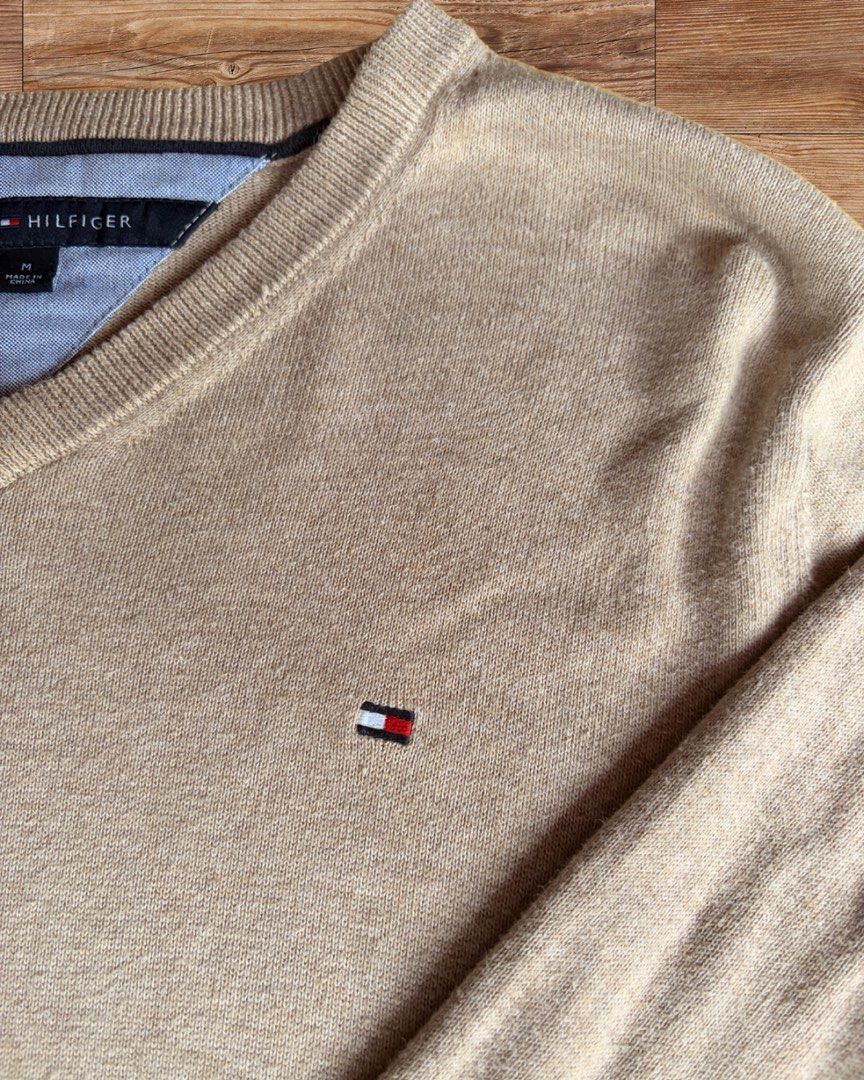Tommy Hilfiger Solid Beige Fine Knit Pullover (Category: Coats, Jackets and Outerwear) located in Palayan City. Submitted by ms.el.apparel (Listing ID 1463669355, Image 3). Description: W 21 in L 26 in Lightweight, breathable cotton knit, perfect for local weather and layering.