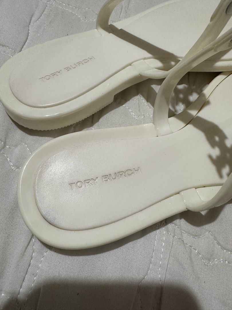 Tory Burch Jelly Slippers (Milky White) (Category: Slippers and slides) located in Davao. Submitted by krau_ (Listing ID 1463664858, Image 2). Description: 100% Authentic or your money back! Used once! Bought in store through US Pasabuy at 6K!!! not ukay source Size 5, fits true to size Logo is still in like new condition No box. Sold as is. Small Flaw: Bluish mark on the heel part (insole). Not visible when worn.