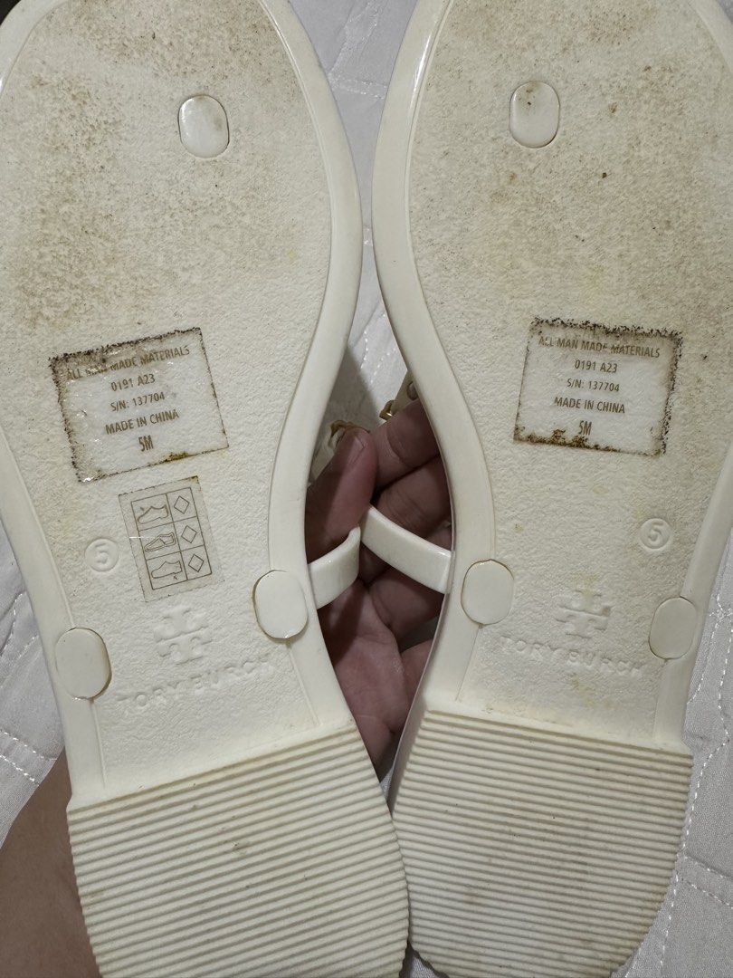 Tory Burch Jelly Slippers (Milky White) (Category: Slippers and slides) located in Davao. Submitted by krau_ (Listing ID 1463664858, Image 3). Description: 100% Authentic or your money back! Used once! Bought in store through US Pasabuy at 6K!!! not ukay source Size 5, fits true to size Logo is still in like new condition No box. Sold as is. Small Flaw: Bluish mark on the heel part (insole). Not visible when worn.