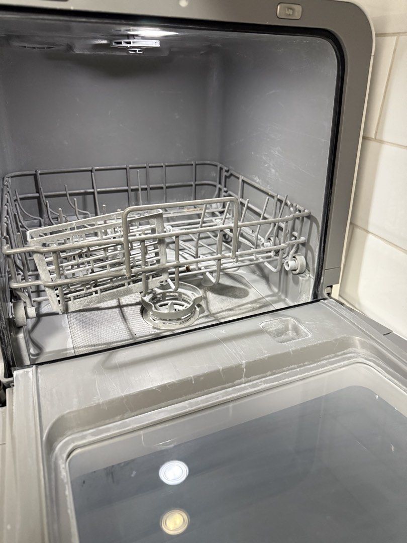 Toshiba 5L Mini Dishwasher 4 Set DWS-22APH(K) (Category: Dishwasher) located in Taguig. Submitted by quickfire_275770 (Listing ID 1463668697, Image 3). Description: - Toshiba Mini Dishwasher - Model: DWS-22APH(K) - Capacity: 5 Liters (fits 4 sets of dishes) - Features: Multiple wash options, 360-degree wash - Compact design, ideal for small spaces Purchased price: 19500 php Purchased date : Mar 2024 Still working well. Partially rusted in the inn