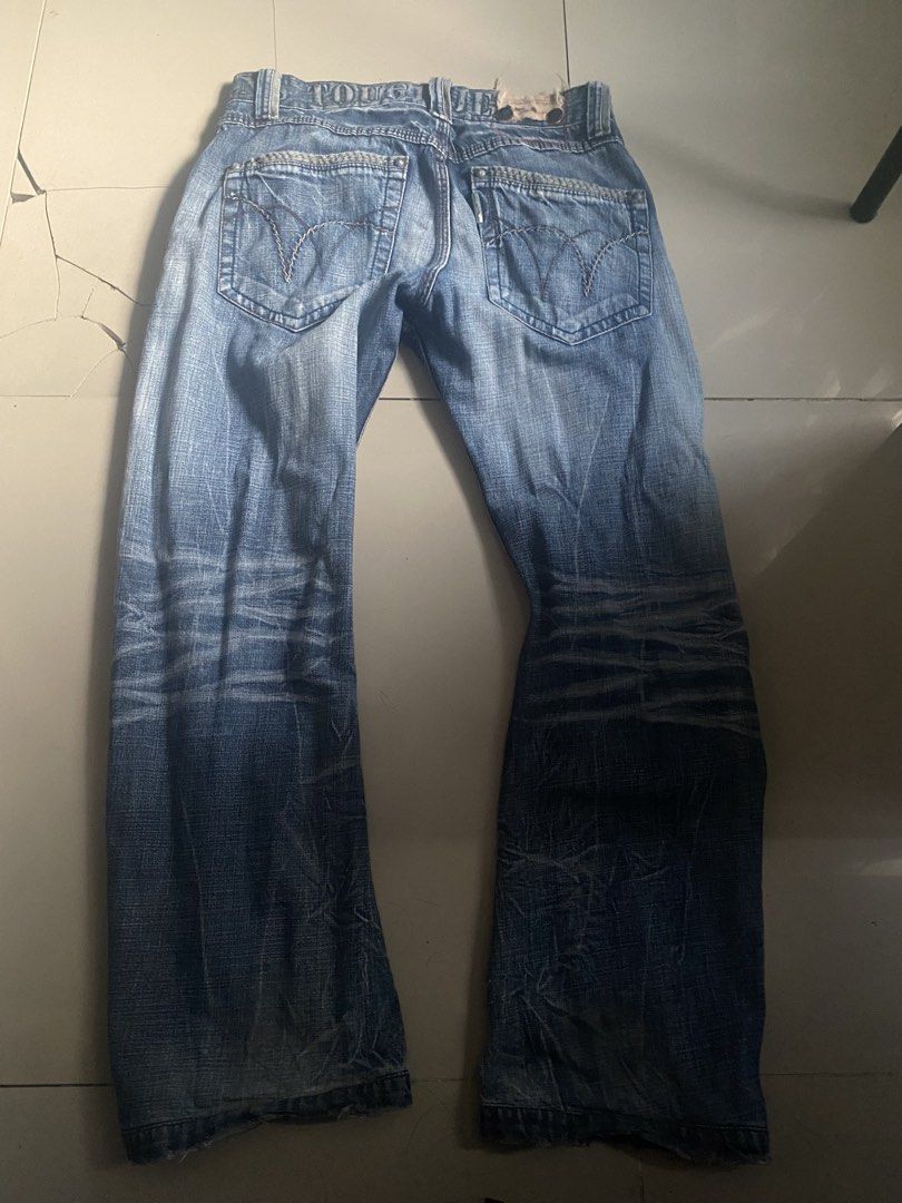 Tough Jeansmith Denim Jeans (Category: Jeans) located in Quezon City. Submitted by beepboop2506 (Listing ID 1463735040, Image 2). Description: - Tough Jeansmith distressed denim jeans - Classic blue wash with fading and whiskering - Straight leg fit - Button fly closure - Unique stitching and pocket detail.