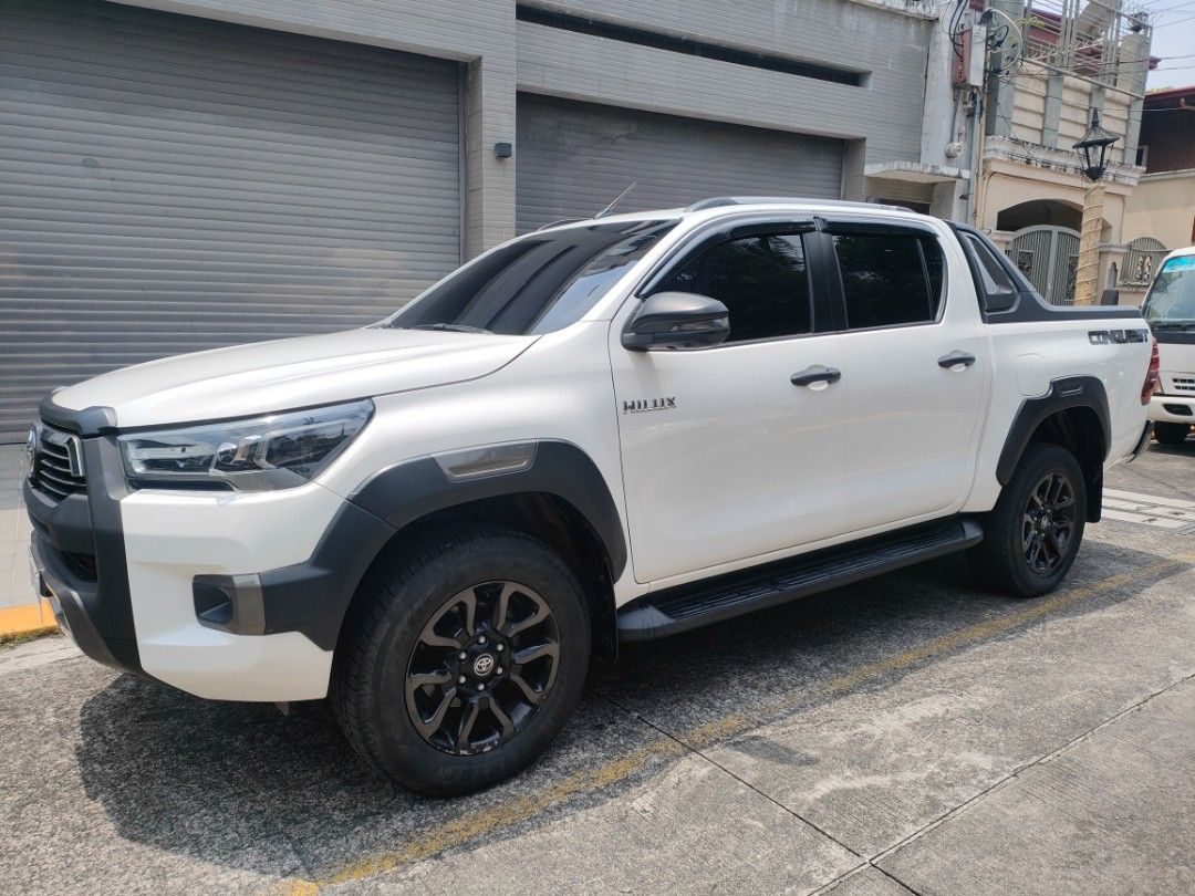 Toyota Conquest V. Manual (Category: Used Cars) located in Manila. Submitted by maochetong (Listing ID 1463615202, Image 2). Description: Top of the Line 2022 Toyota Hilux V Conquest 4x4 Manual Transmission 360 Reverse Cam Touch Screen Radio with Cruise Control All Orig and Stock Cold AC 2 Original Key 90% Tire Thread 55k Mileage Complete and Legal Documents Ready for Transfer Register PM/Contact : 0905-687-0416.