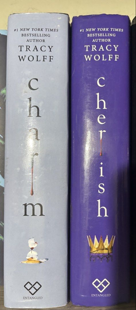 Tracy Wolff "Charm" & "Cherish" Books (Category: Storybooks) located in Caloocan City. Submitted by alnair7 (Listing ID 1463651319, Image 1). Description: - Two books by #1 New York Times bestselling author Tracy Wolff - Titles included: 'Charm' (light blue cover) and 'Cherish' (vibrant purple cover) - Part of a popular series - Ideal for fans of Tracy Wolff or this book series.