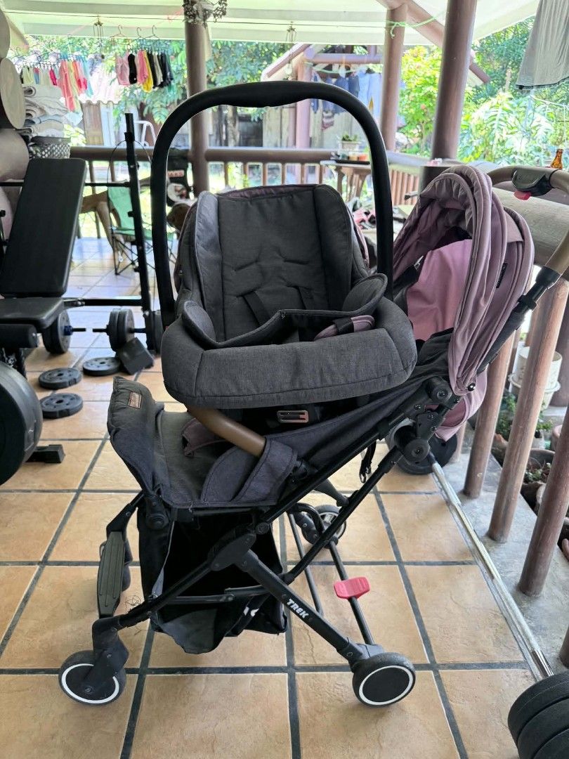 Trek Stroller with Infant Car Seat (Category: Strollers) located in Manila. Submitted by jacques.millian (Listing ID 1463619851, Image 2). Description: Apruva Trek - Versatile 2-in-1 stroller system - Includes stroller frame and infant car seat - Stroller has a sun canopy - Car seat securely clicks into the stroller - Features stylish brown handlebars - Swivel wheels for effortless maneuvering - Ideal for families on the go Slightly negotiable .